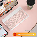 Bluetooth keyboard for tablets and PCs in a choice of colours including white, green, and pink.
