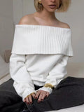 Grey off-the-shoulder sweater with 3D pattern and strapless V-neck design