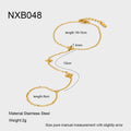 Gold-coloured stainless steel women's bracelet with eight-pointed star and floral charm design