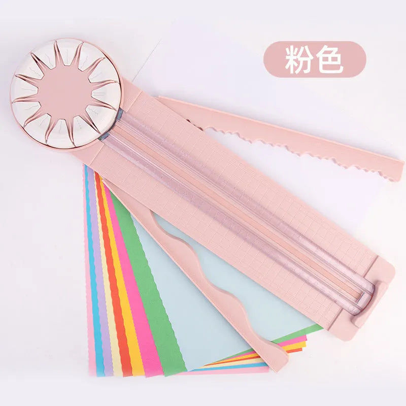 Pink 12-in-1 multifunctional paper cutting machine with plastic construction measuring 46.2cm wide