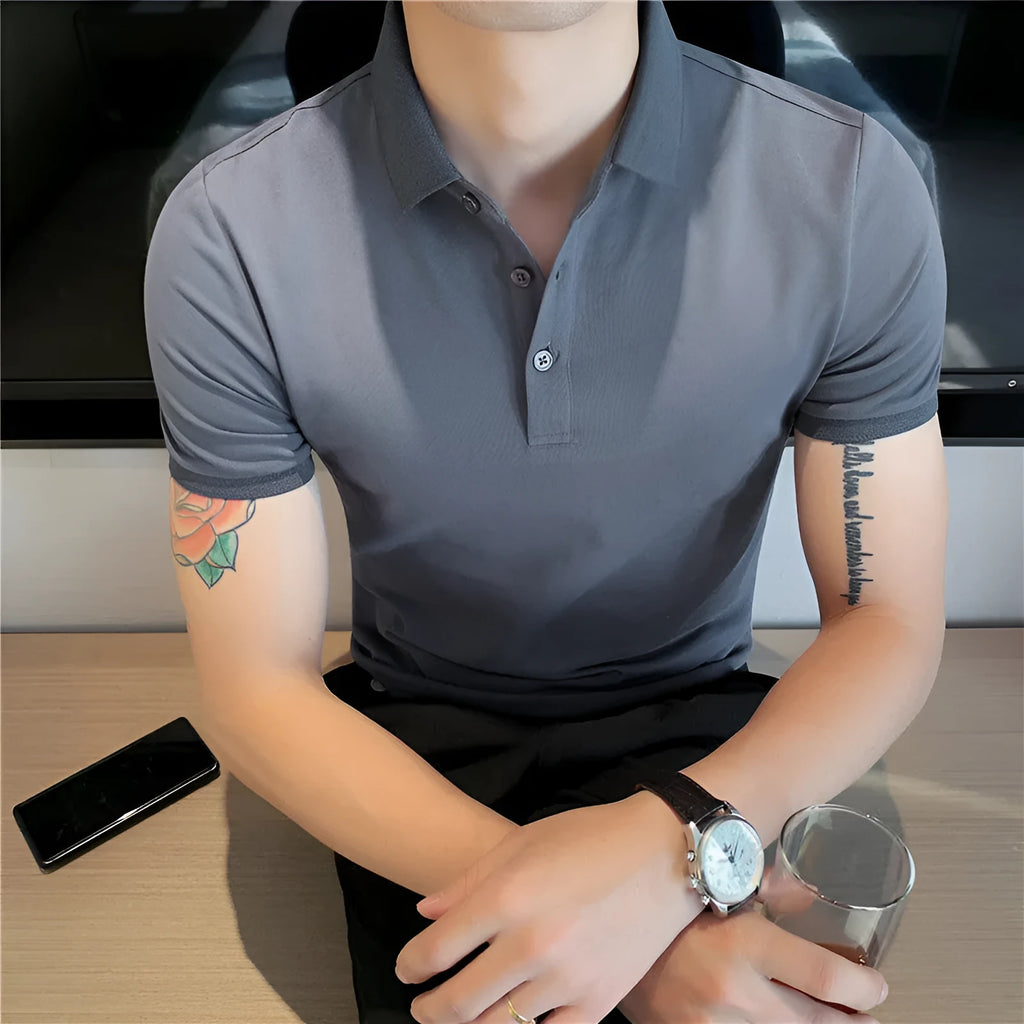 Man's solid colour cotton blend polo shirt with lapel collar and short sleeves in Korean style fit.