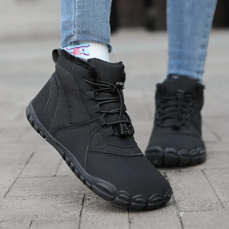 Pair of front lace-up snow boots with round toe, showing black umbrella cloth upper and rubber sole.