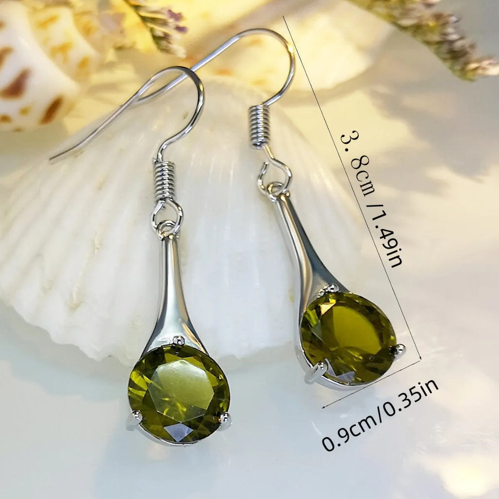 Olive green topaz water drop shaped earrings with electroplated finish and retro styling