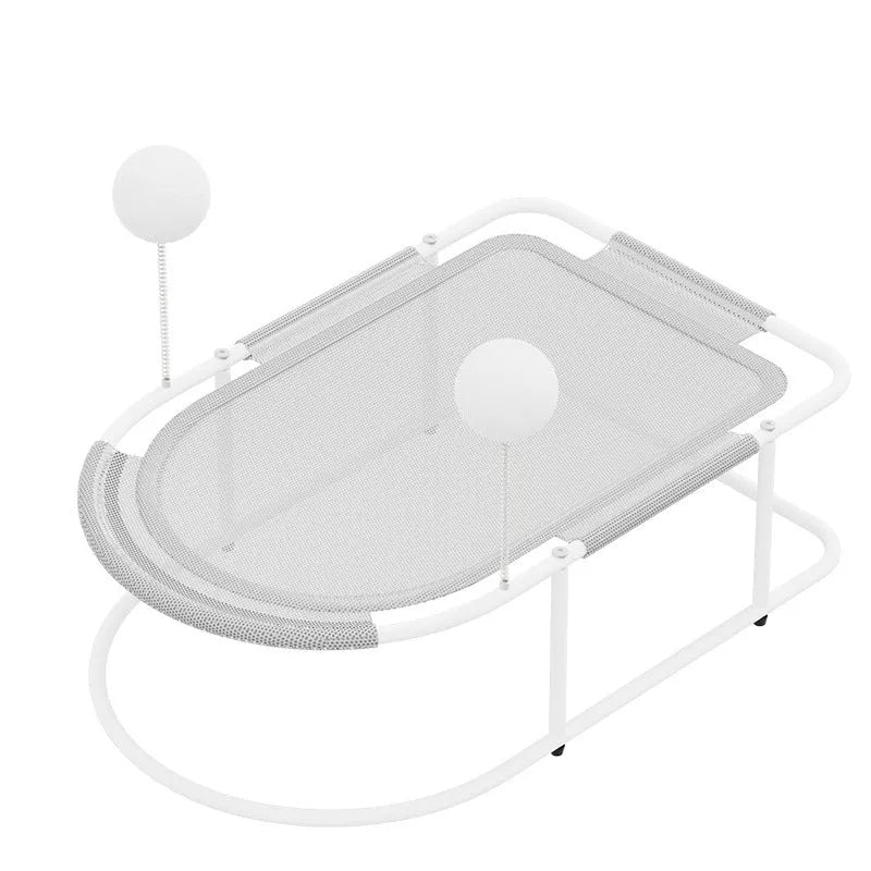 Large grey fabric kennel cage bed for a cat resting inside.