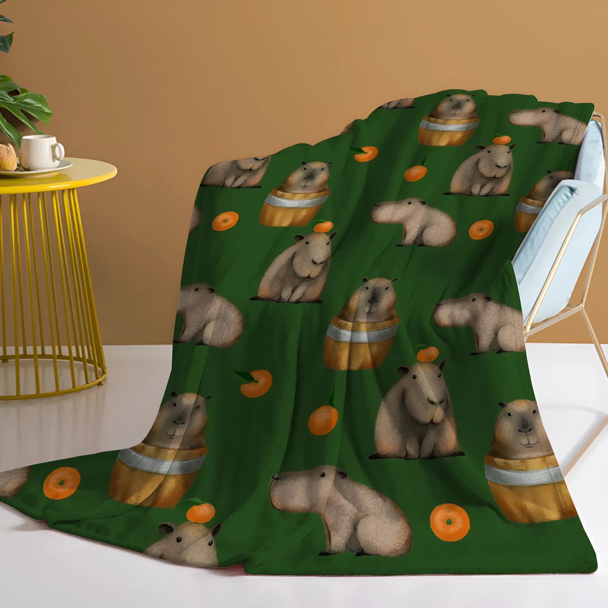Flannel orange and capybara pattern soft fluffy multifunctional printed blanket on sofa