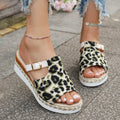 Leopard print wedge platform sandal with a fish mouth open toe on a rubber sole.