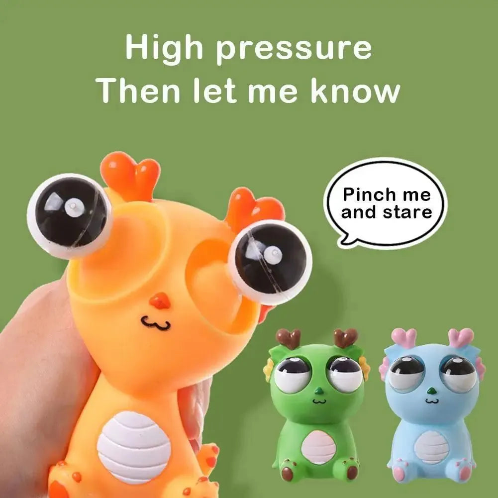 Eyeball Burst Squeeze Toy in blue colour with cute staring dragon design