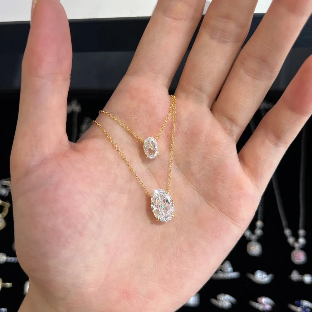 Oval ice flower geometric pendant on a sterling silver necklace with a choice of platinum or gold electroplated finish.