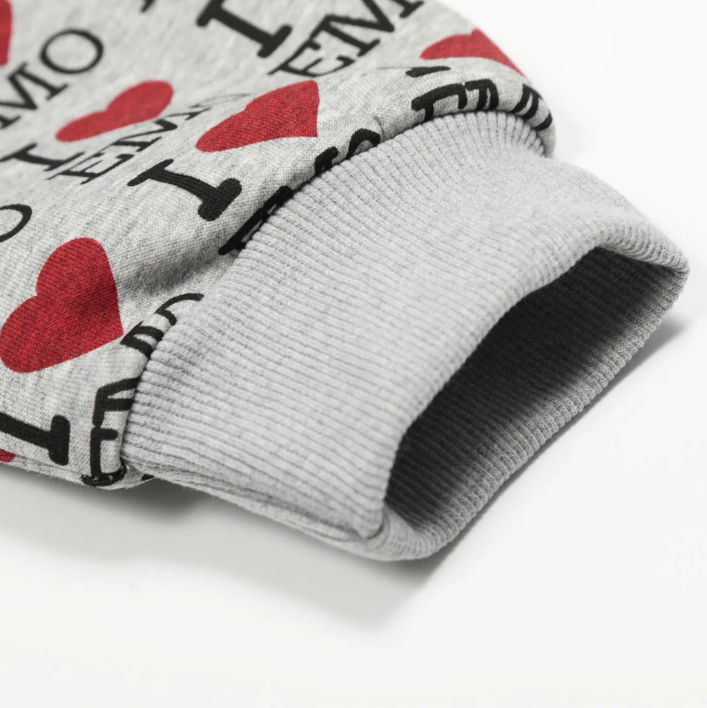 Women's melange grey cotton hooded cardigan with a retro autumn pattern, shown in a street fashion style.