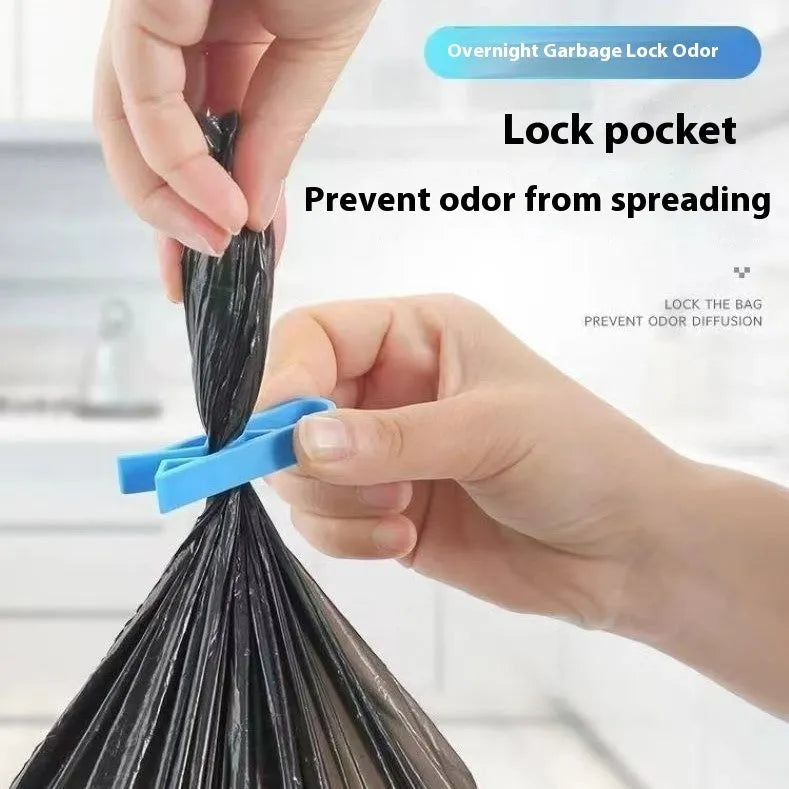 White PP plastic non-slip clip for holding a garbage bag onto a rubbish bin.