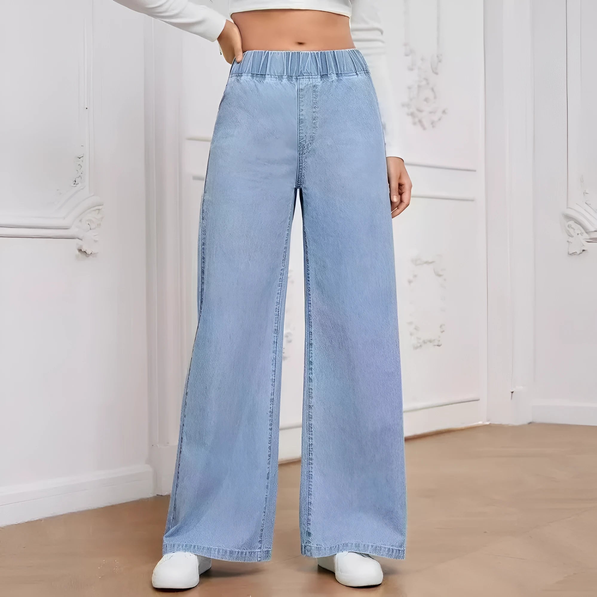 Light blue washed plus size wide-leg jeans with straight cut and mid waist design