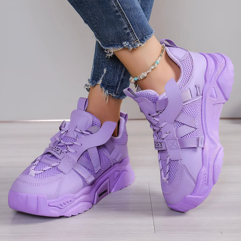 Women's platform mesh sneakers in purple, green, white, pink, and yellow colours with lace-up front.