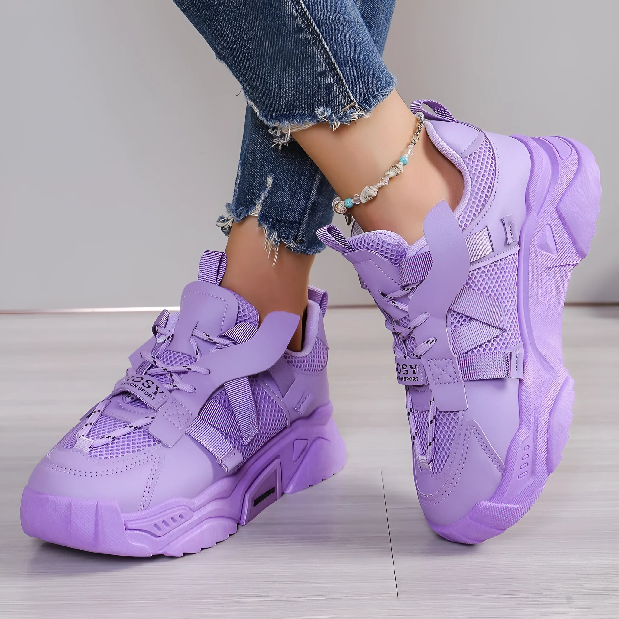 Women's platform mesh sneakers in purple, green, white, pink, and yellow colours with lace-up front.