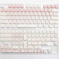 Full set of PBT key caps for mechanical keyboards showing over 98 keys in universal layout