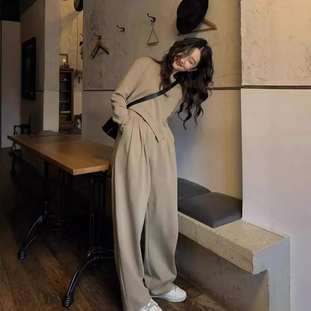 Women's brown loose-fit polyester sports suit set with long sleeves and full-length trousers.