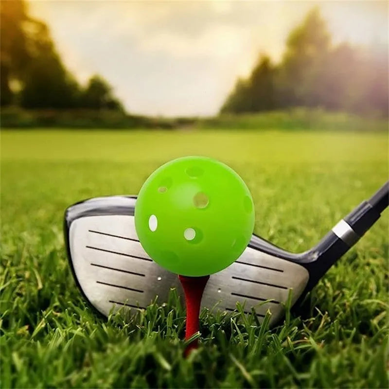 Multi-colour golf practice balls in red, orange, blue, green, white and yellow with net packaging