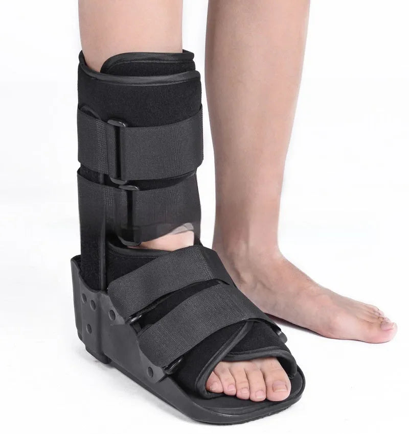 Grey achilles tendon rehabilitation boot with adjustable aluminium support plate