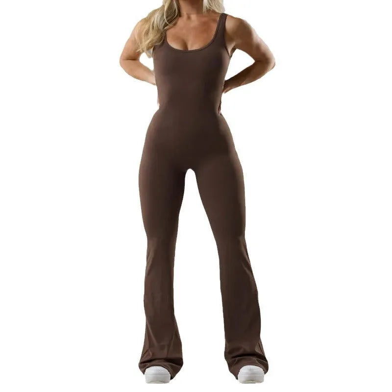Women's black seamless yoga bodysuit jumpsuit with built-in chest pad and mid waist