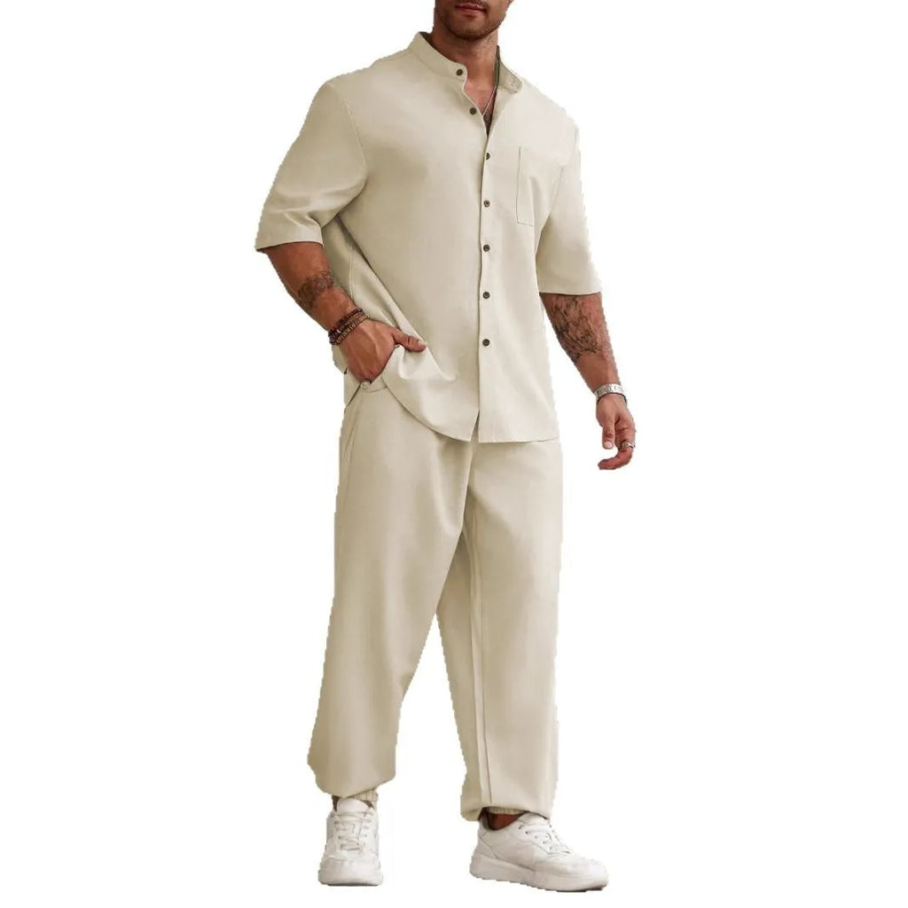 Men's apricot coloured cotton linen short-sleeved shirt jacket and trouser casual set laid flat.