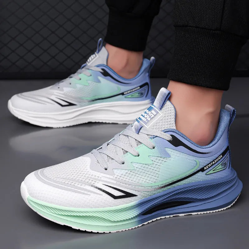Men's low-top casual trainers with woven mesh upper and rubber sole in black, blue-grey, and green-grey colours.