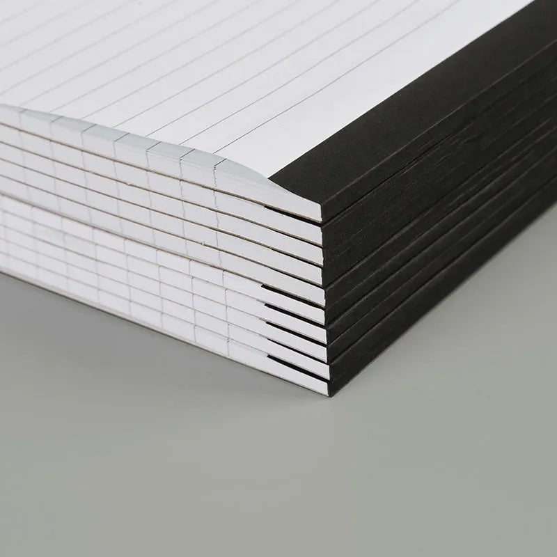 A4 tearable notebook with wireless adhesive binding, showing grid and lined page options