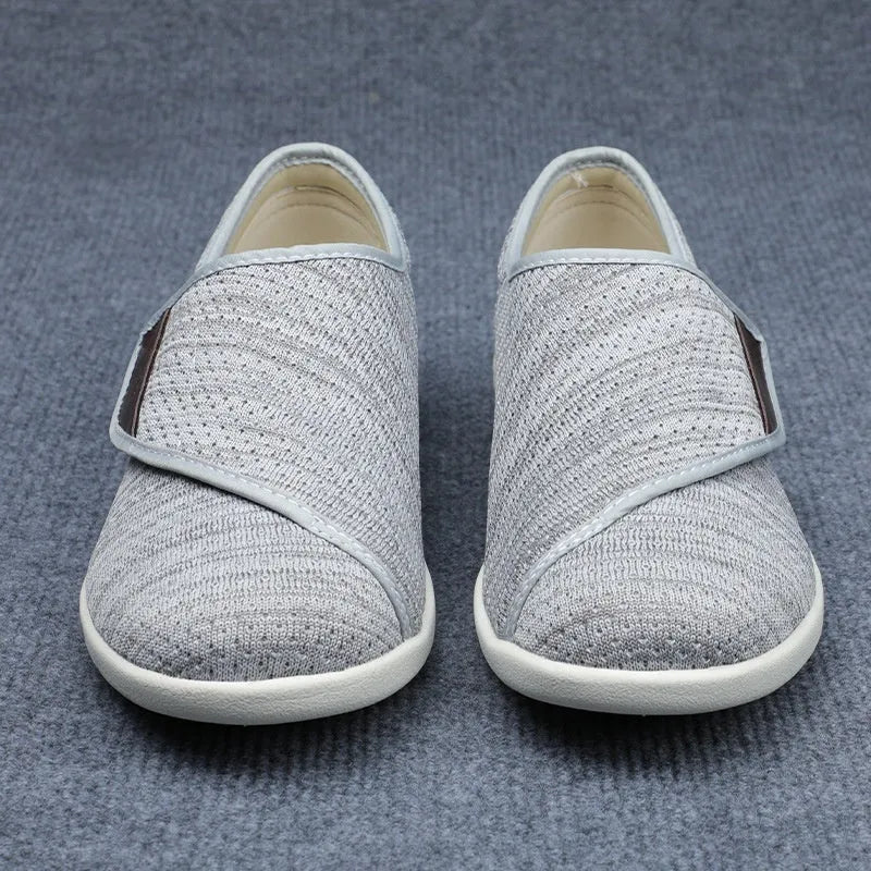 Beige leisure shoes with velcro strap closure and a round toe on a foam rubber sole.