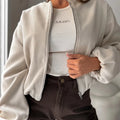 Women's off-shoulder lantern sleeve short coat in brown colour showing loose casual fit