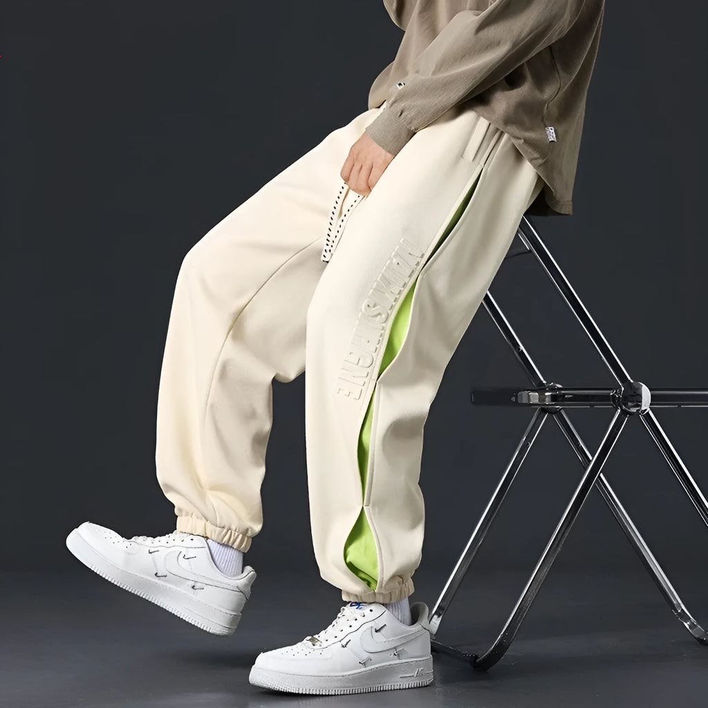 Men's loose cotton pants with ankle banded style and stitching printing details in multiple colours
