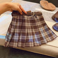 Children's plaid pleated skirt in cotton blend fabric with A-line silhouette available in multiple height options