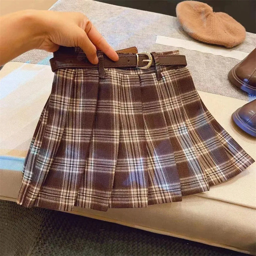 Children's plaid pleated skirt in cotton blend fabric with A-line silhouette available in multiple height options