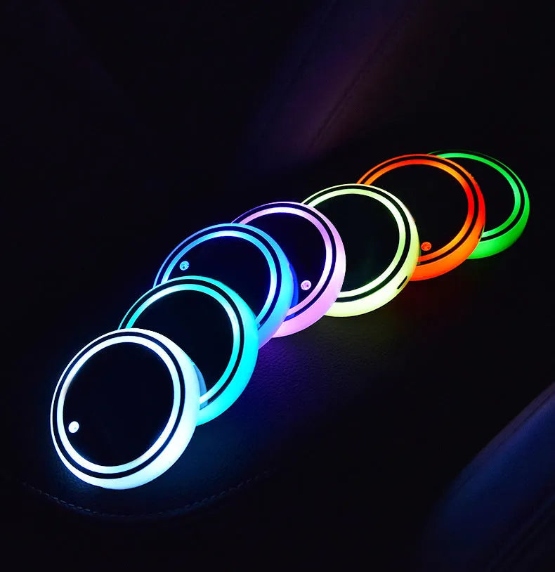 Car cup holder LED light-up coaster showing 7 colour options with USB charging cable