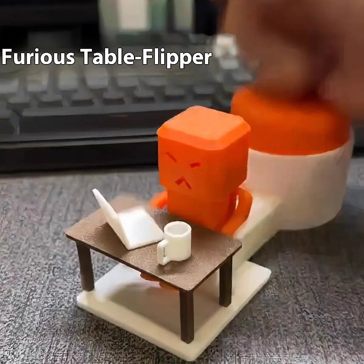 Orange plastic table turning decompression toy artefact on a flat surface.