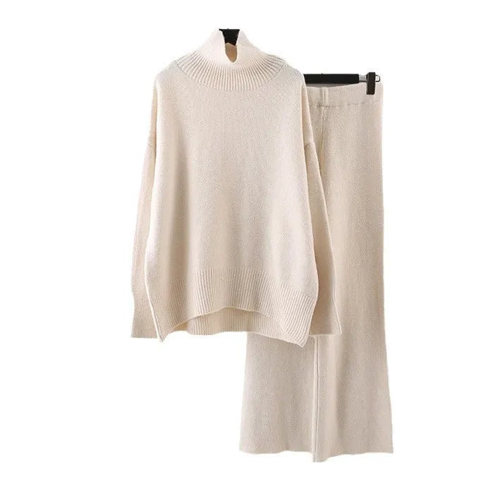 Women's casual two-piece set with an acrylic sweater and wide-leg trousers in a solid colour.