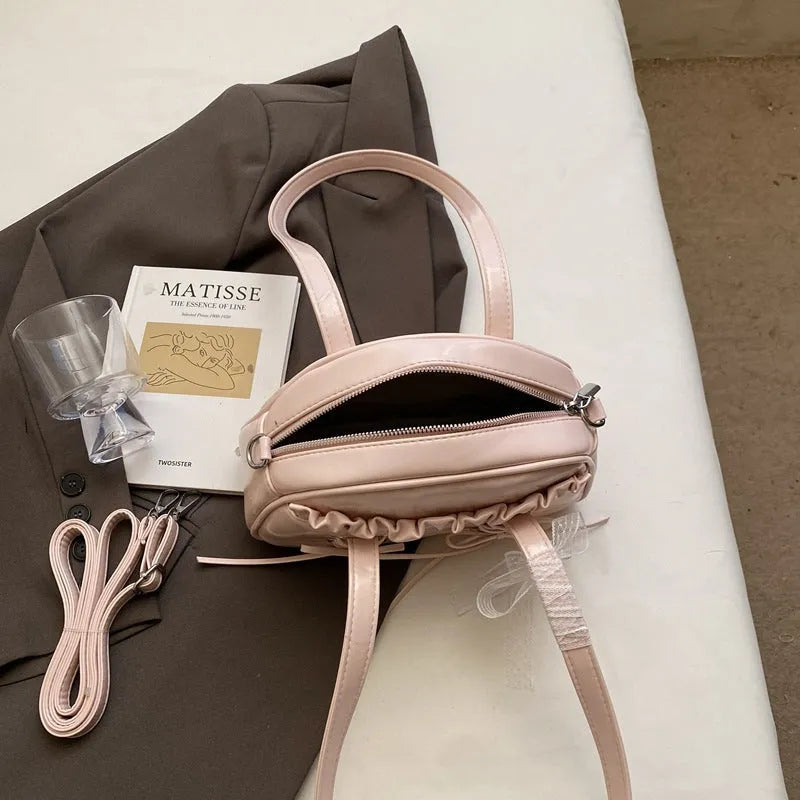Women's bandage bow shoulder handbag in PU leather with mobile phone compartment