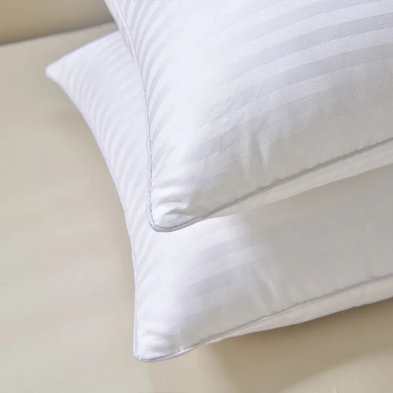 White hotel cotton satin stripe pillow core with feather and cotton filler shown in three size options.