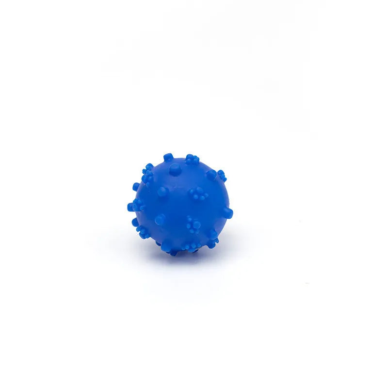 Blue, green, pink, and yellow squeaky dog balls with a spiky texture and paw print dimples.