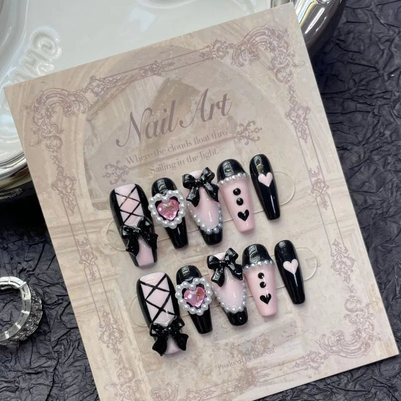 Black pink heart hand-painted detachable false nails with bow decorations in cat's eye style
