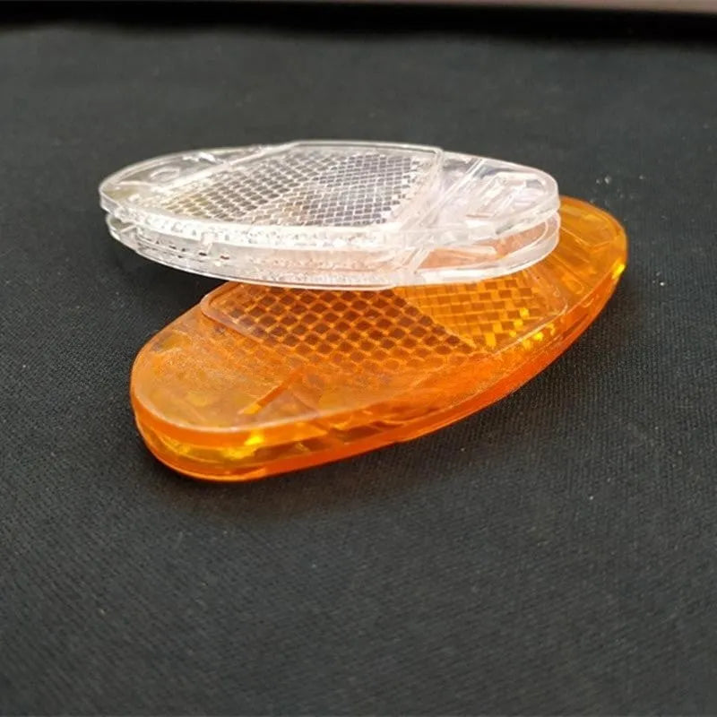 Set of four plastic bicycle spoke reflectors in yellow and white colours showing measurements