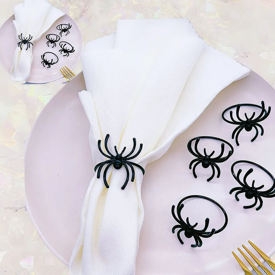 Six black spider-themed alloy napkin rings for Halloween table decorations