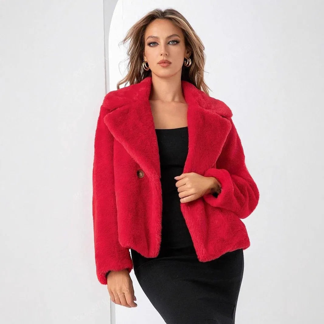 Women's loose short coat in rose red faux fur with regular sleeves, showing 50cm length.